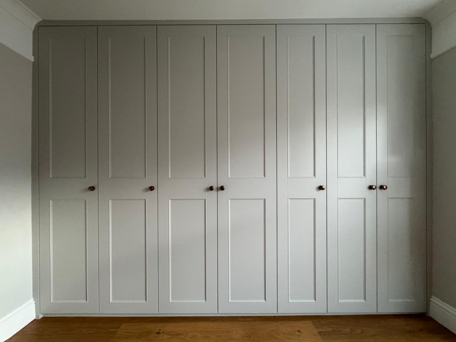 Floor to ceiling painted wardrobes in Ascot bedroom