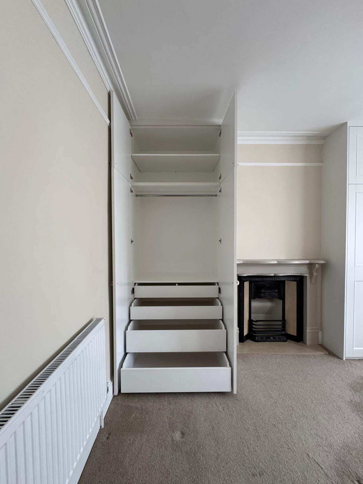 Bespoke fitted sliding door wardrobes in Windsor bedroom