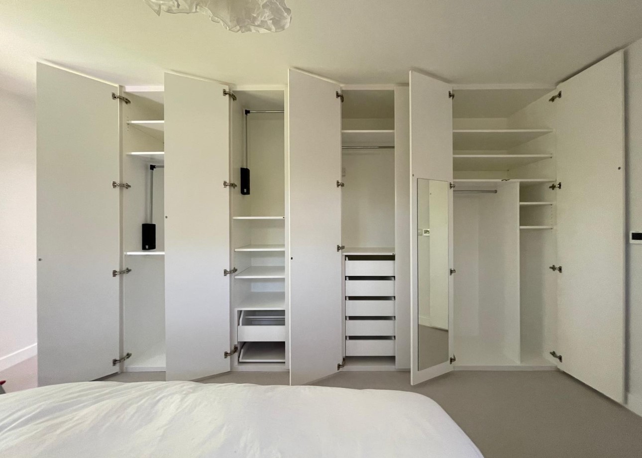 Bespoke fitted bedroom storage handcrafted in Windsor workshop