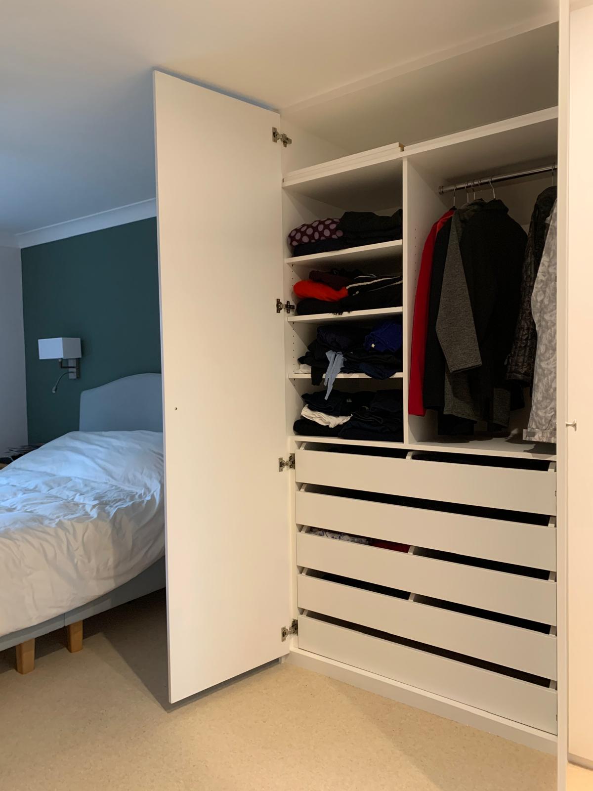 Handcrafted fitted wardrobes with integrated lighting in Windsor home