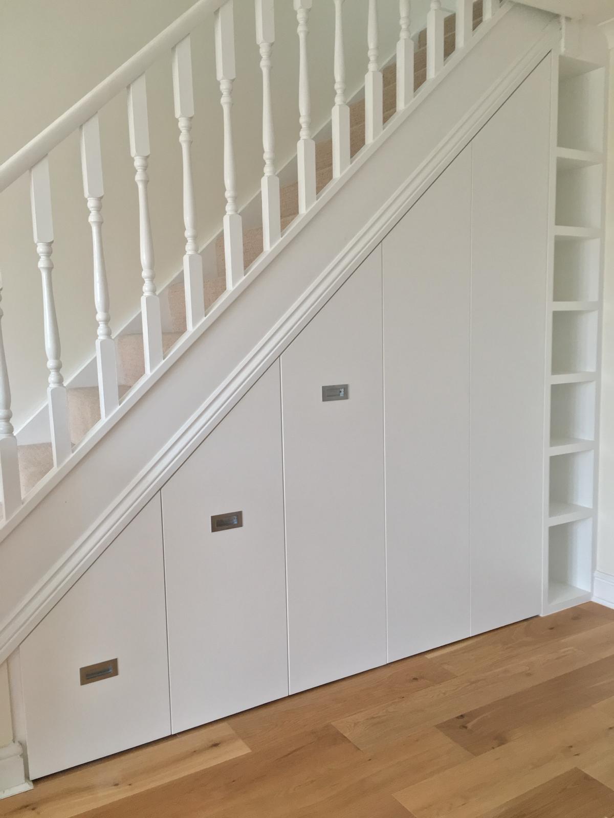 Custom fitted cloakroom with coat storage and bench seating in Berkshire