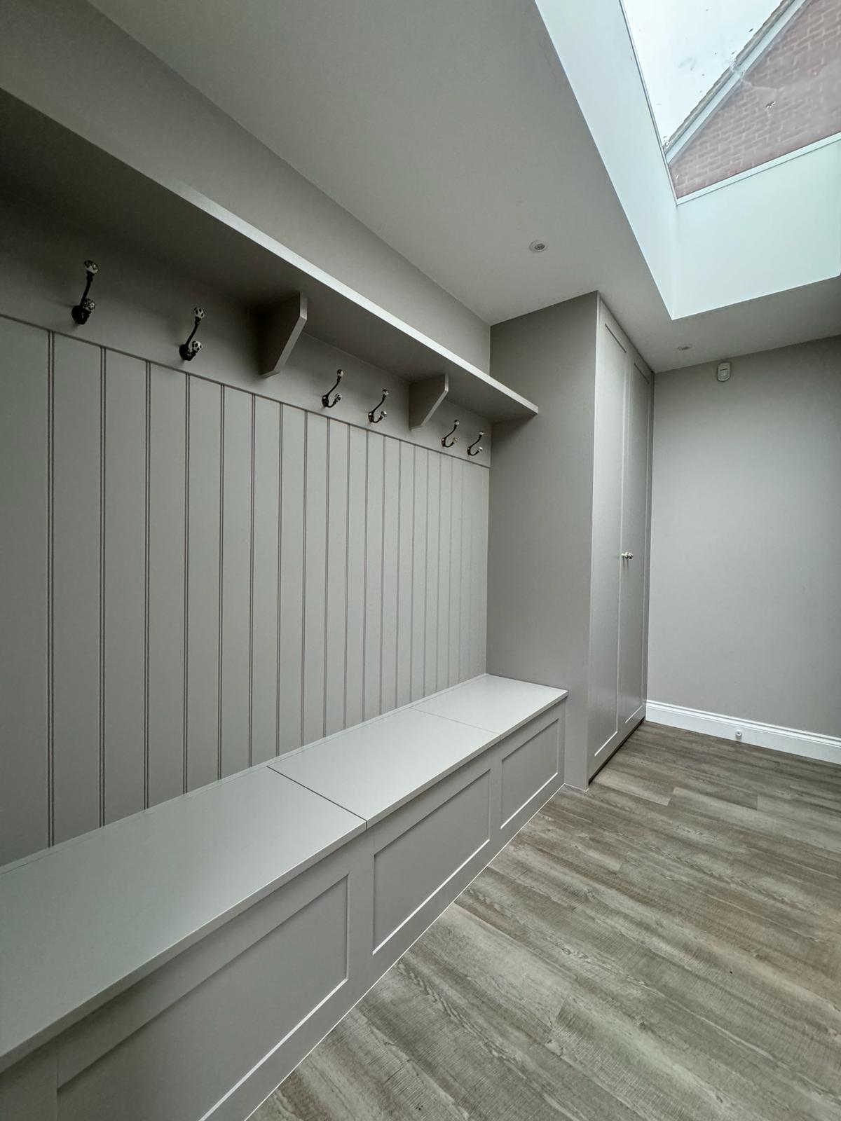 Fitted cloakroom with WC and vanity storage in Berkshire