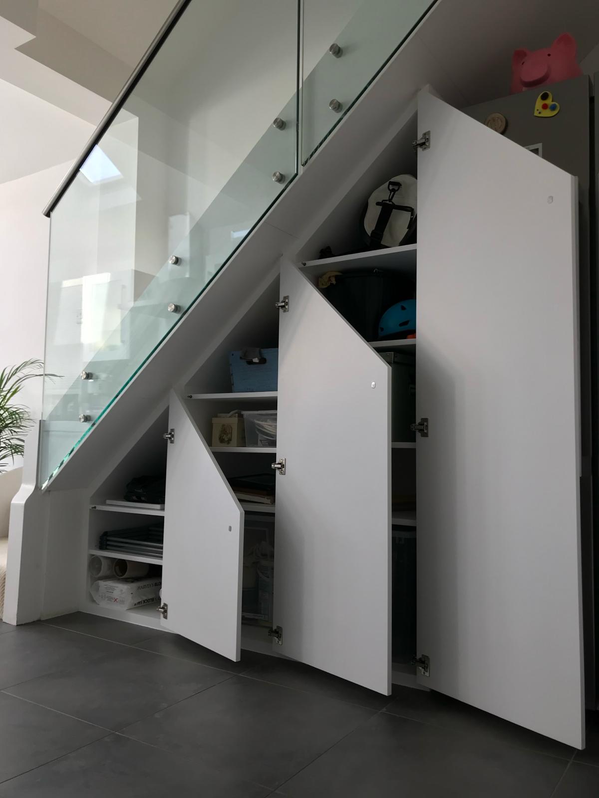 Bespoke under-stairs storage with pull-out drawers in Berkshire