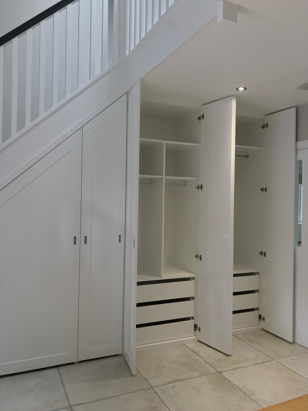Bespoke fitted cloakroom with hooks and coat storage in Slough