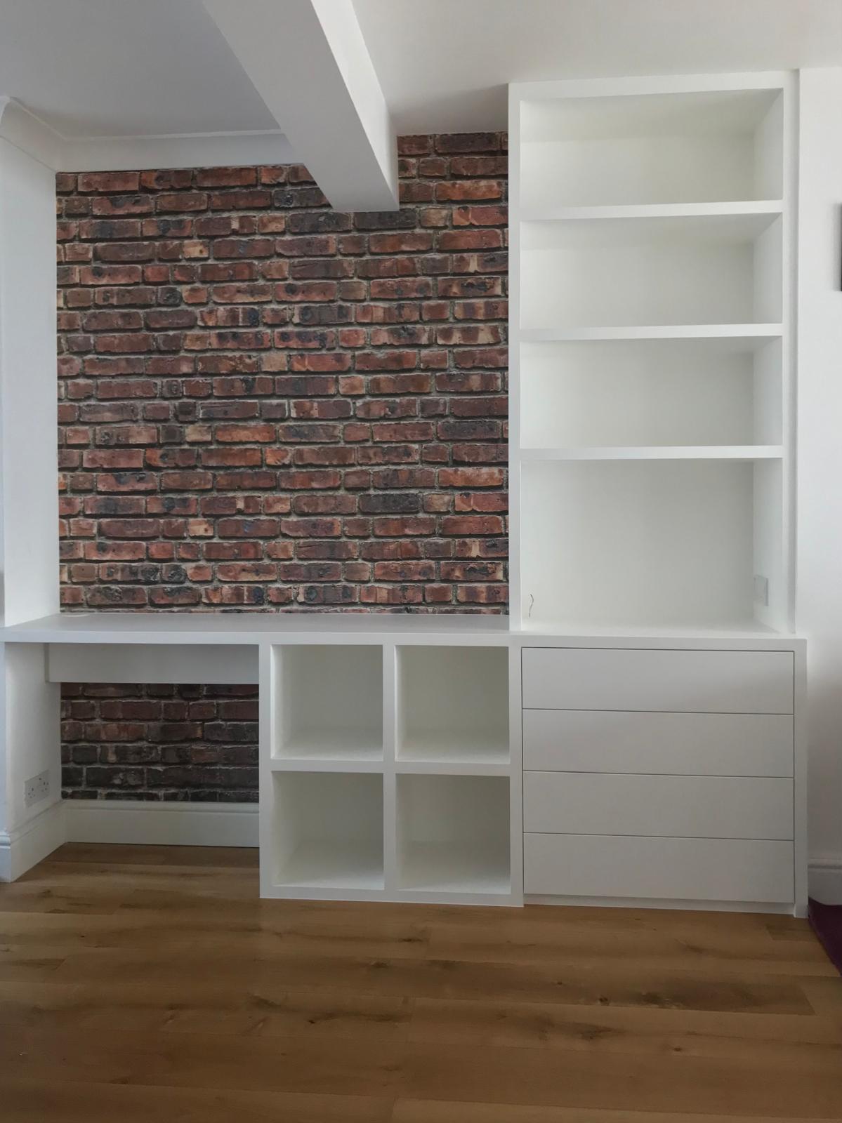 Custom fitted study with painted cabinetry in Ascot home