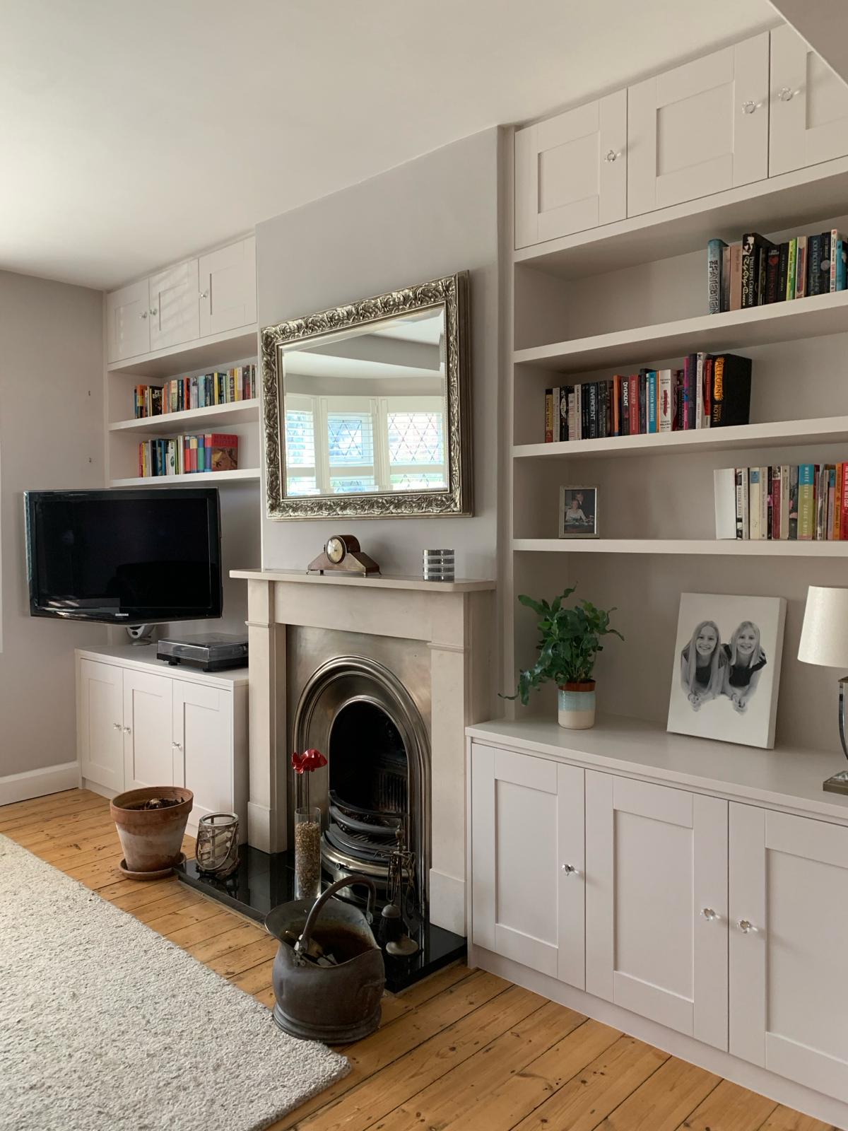 Bespoke fitted living room with painted cabinetry in Windsor