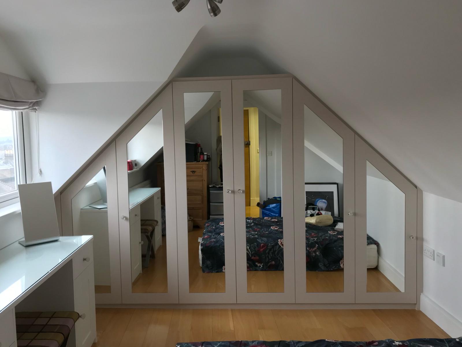 Custom fitted loft bedroom with built-in wardrobes in Ascot