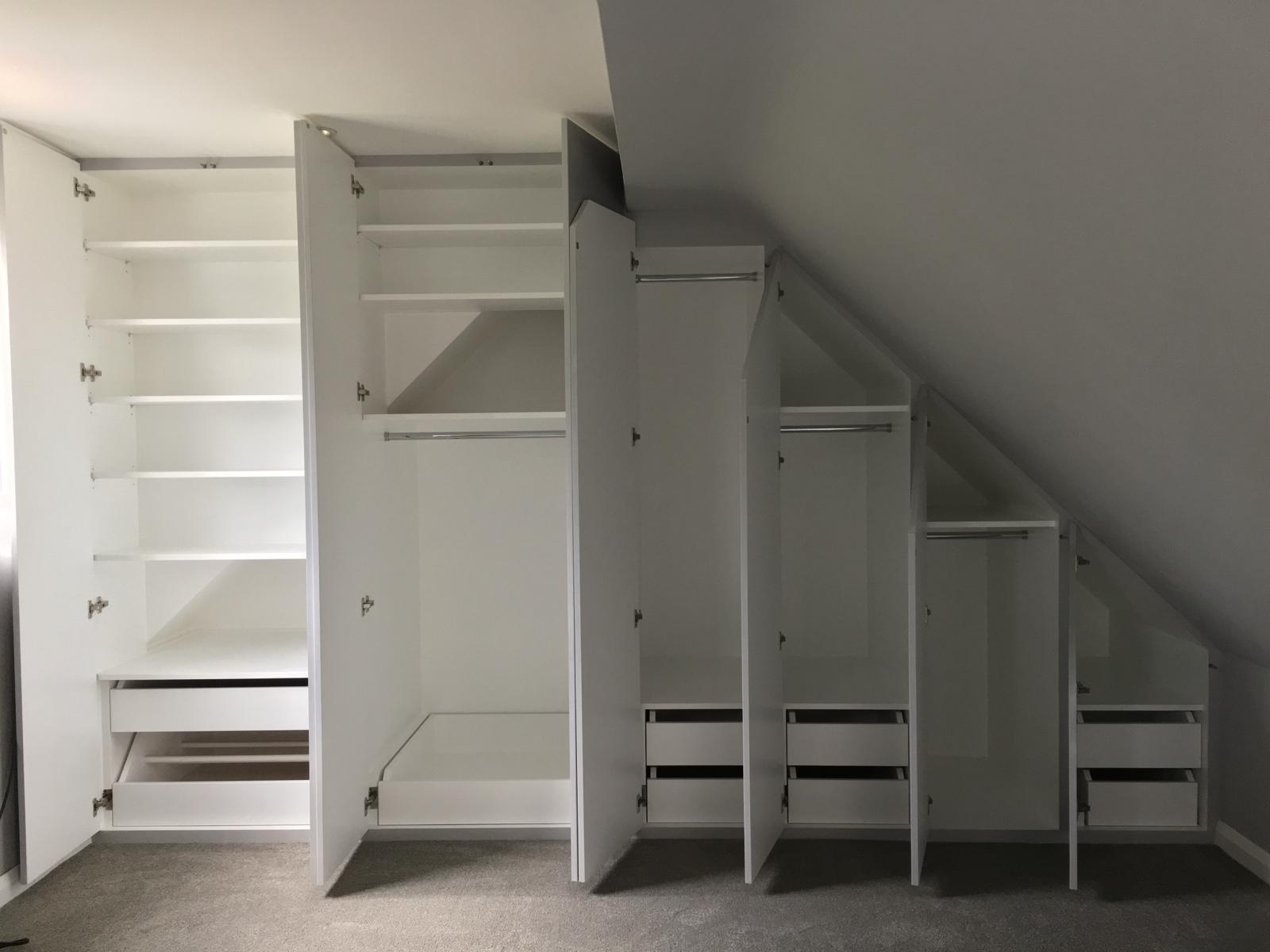 Handcrafted loft conversion furniture with eaves storage in Windsor